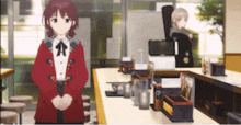 a girl in a red coat is standing in front of a counter in a restaurant
