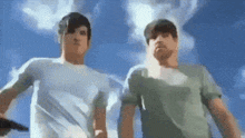 two men are standing next to each other in front of a cloudy sky