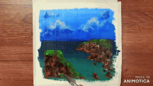 a painting of a landscape with the words made in animotica below it