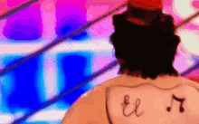 a pixelated drawing of a person with the word el on their back