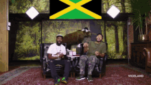 Desus And Mero Jamaican Flag GIF - Desus And Mero Jamaican Flag Fireworks GIFs
