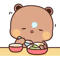 a bear is sitting at a table with a bowl of food