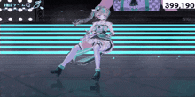 a girl is sitting on a stage with a sign that says 399,190 in the background