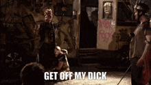 a man kneeling down with the words get off my dick written above him