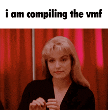 a picture of a woman with the words " i am compiling the vmf " above her