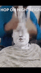 a man with a mask on his face and the words hop on nightreign