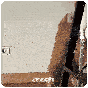 a person sitting on a chair with the word mcdh on the bottom right