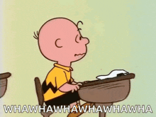 Charlie Brown Studying Cartoons GIF