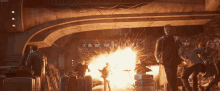 a group of people standing in front of a large explosion in a video game
