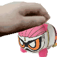 a person is holding a stuffed animal with a helmet on .