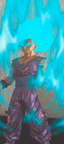 a figurine of a man with a blue hairdo