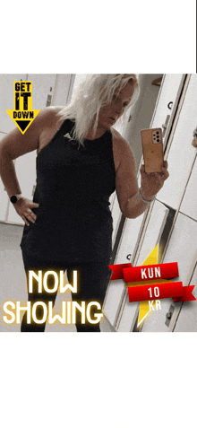 a woman taking a picture of herself in a locker room with the words now showing