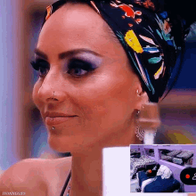 a close up of a woman 's face with the words ivonnegifs on the bottom
