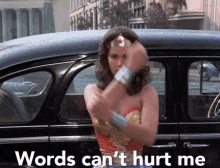Word Cant Hurt Me GIF - Wonderwoman Words Canthurtme GIFs