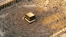 a large crowd of people are gathered around a mosque