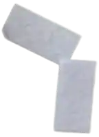 a pair of white sponges are sitting on top of each other on a white surface .