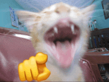 a cat with its mouth wide open and a yellow fist pointing at it