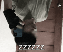 a man is taking a picture of himself with the words zzzz on the bottom right