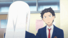 a man and a woman are standing next to each other