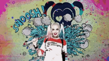 harley quinn from suicide squad is wearing a pink shirt that says queen of hearts