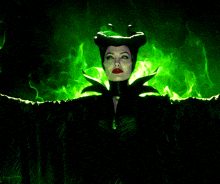 a woman with horns and red lips is surrounded by green smoke