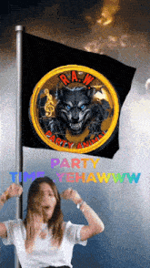 a woman is dancing in front of a raw party animal flag