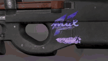 a black gun with a purple sticker that says antwerp