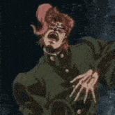 a man with red hair and glasses is sitting in front of a green statue .