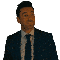 a man in a suit and tie is looking up at something