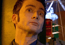 a close up of a man 's face with the hashtag @itsscottiesstark on the bottom