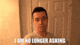 a man taking a selfie with the words i am no longer asking above him