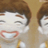 a close up of a cartoon character 's face with a big smile on it .