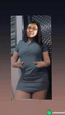 a picture of a woman with glasses and a green apple that says calamansi at the bottom