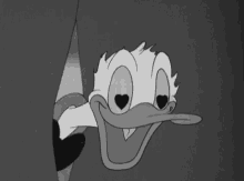 a black and white cartoon of donald duck peeking out from behind a wall .