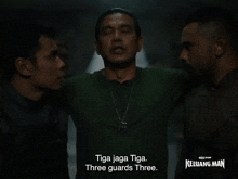 tiga jaga tiga three guards three is displayed on the screen