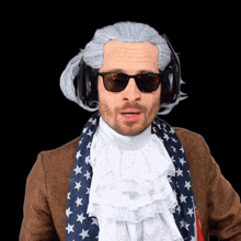 a man wearing a wig sunglasses and a scarf
