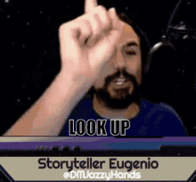 a man with a beard is giving the middle finger and the words look up are above him