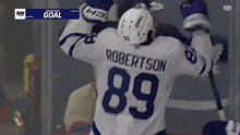 a hockey player with the name robertson on the back of his shirt