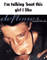 a woman in a black bra is on the cover of a deftones album