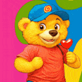 a teddy bear wearing a blue hat is holding a red heart shaped lollipop