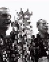 a black and white pixel art of a group of people standing next to each other