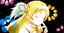 a girl with yellow hair has a flower in her hair and a bow