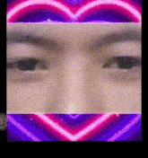 a close up of a person 's face with a heart in the background