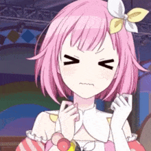 a girl with pink hair is making a funny face with the letter v on her face