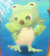 a stuffed animal in a frog costume is in the water .
