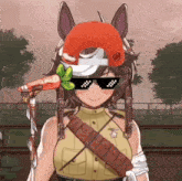 a girl wearing sunglasses and a hat with a carrot on it
