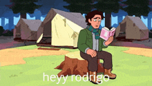 a man is sitting on a tree stump reading a book