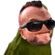 a man wearing sunglasses and a green shirt is making a face .