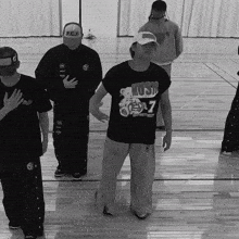 a man in a black shirt that says music 7