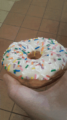 Vanilla Frosted Donut Doughnuts GIF - Vanilla Frosted Donut Doughnuts Sprinkles GIFs